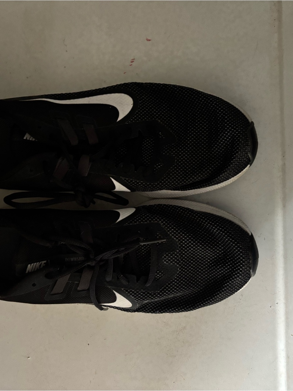 Nike Black Athletic Running Shoes with White Swoosh